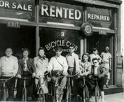 Everything Bicycles - : c.1940`s GROUP OF 7 WITH SAFETIES POSING IN FRONT OF A BIKE SHOP-Bicycle Club of America: Photographs-Antique Collectables (tin, glass, paper)